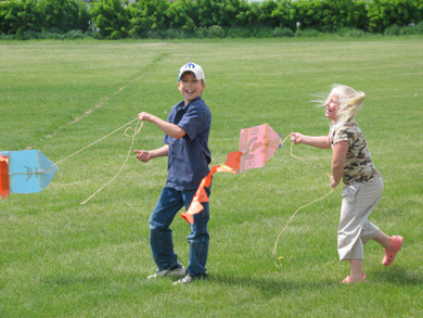 Students attending Dorothy Dalgliesh Elementary School, in Picture Butte, launch kites they made in art class.