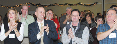 Delegates attending the Emergent Representative Assembly, held November 24, 2007, in Edmonton, show their support for the memorandum of agreement. 